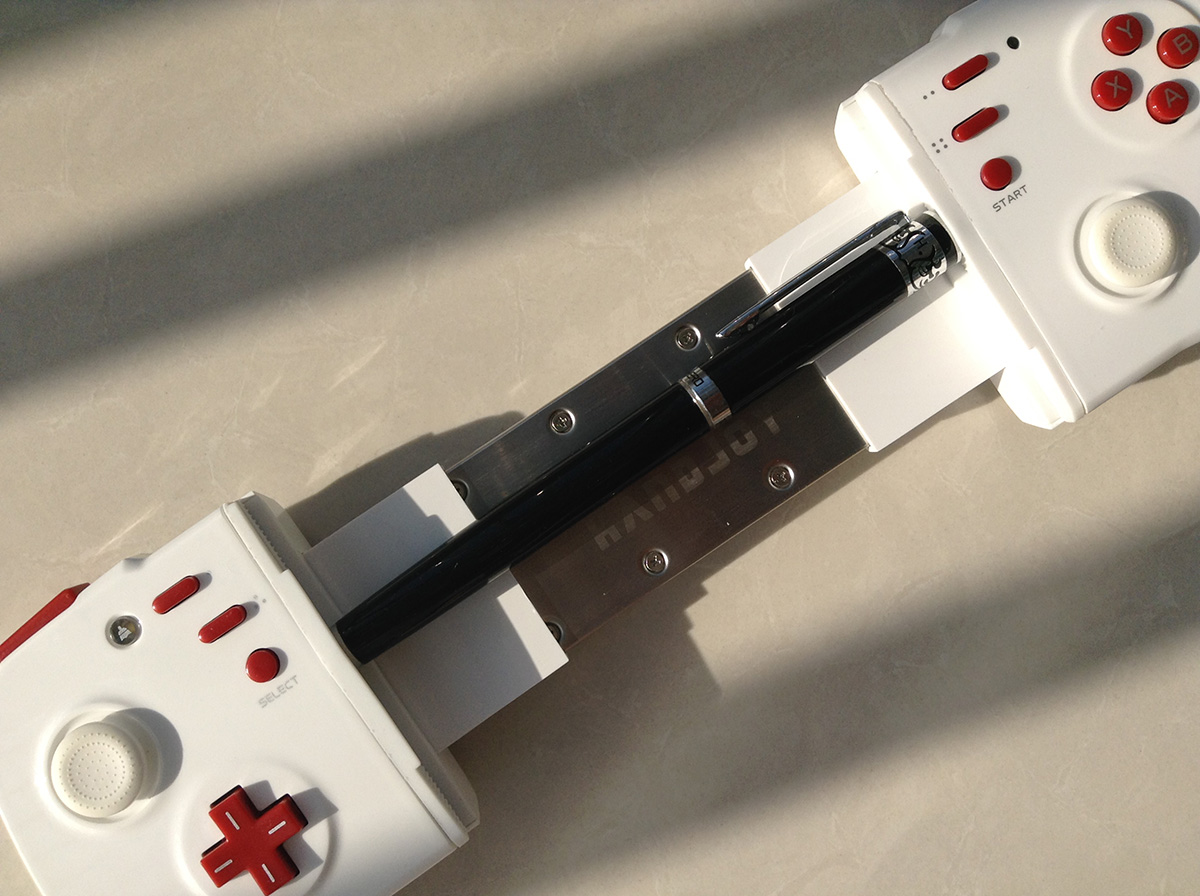 魂斗罗 手柄玩_手机游戏手柄推荐_handjoy超薄智能游戏手柄