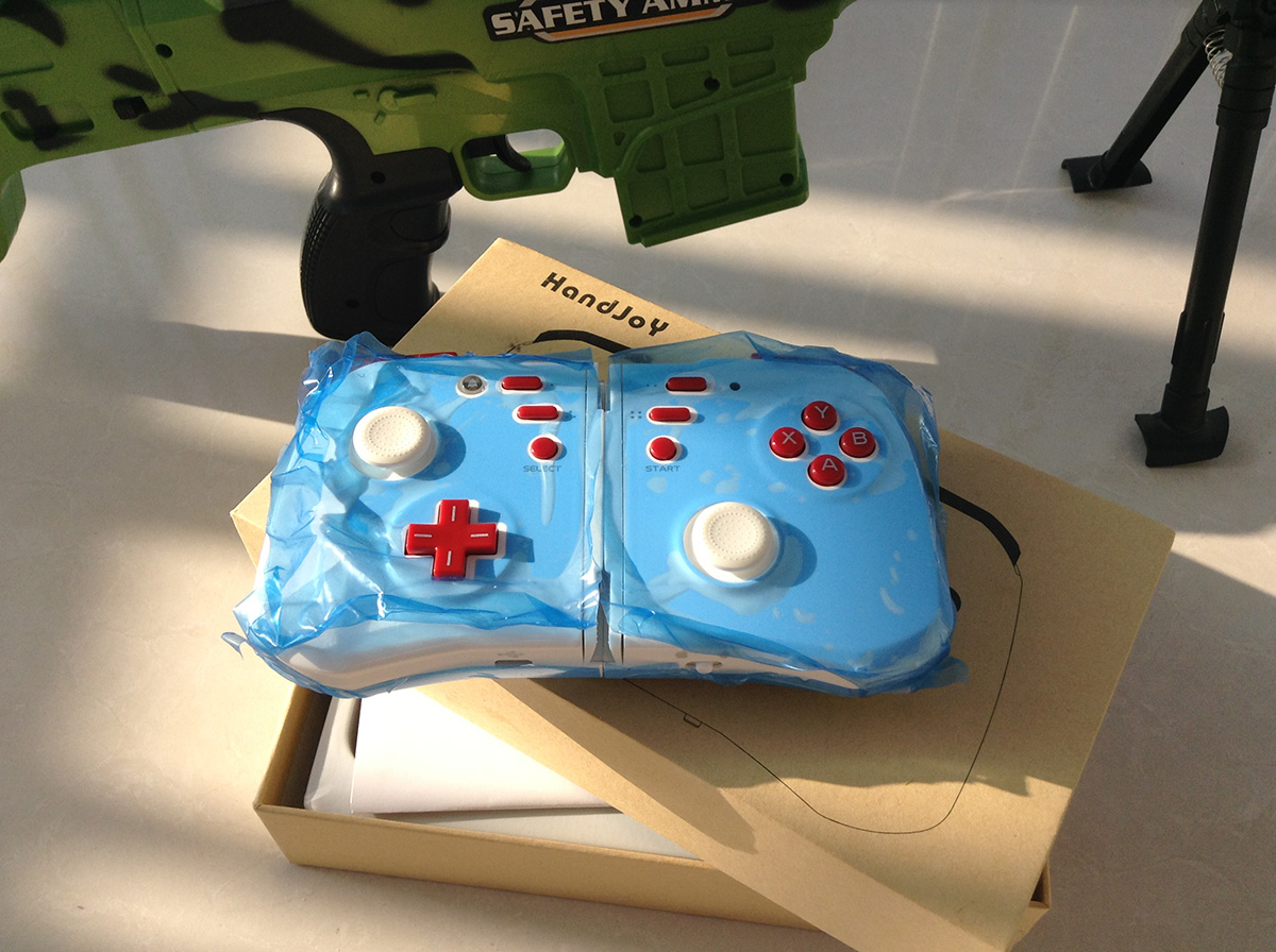 handjoy超薄智能游戏手柄_手机游戏手柄推荐_魂斗罗 手柄玩